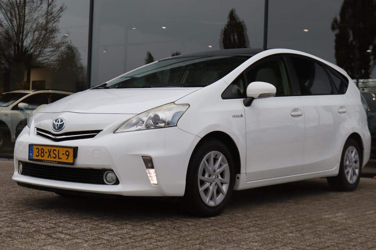 Toyota Prius Wagon - 1.8 HYBRID 7-PERS. AUT. | PANO | CAMERA | HEAD-UP | NAVI | PRIVACY | KEY-LESS - AutoWereld.nl