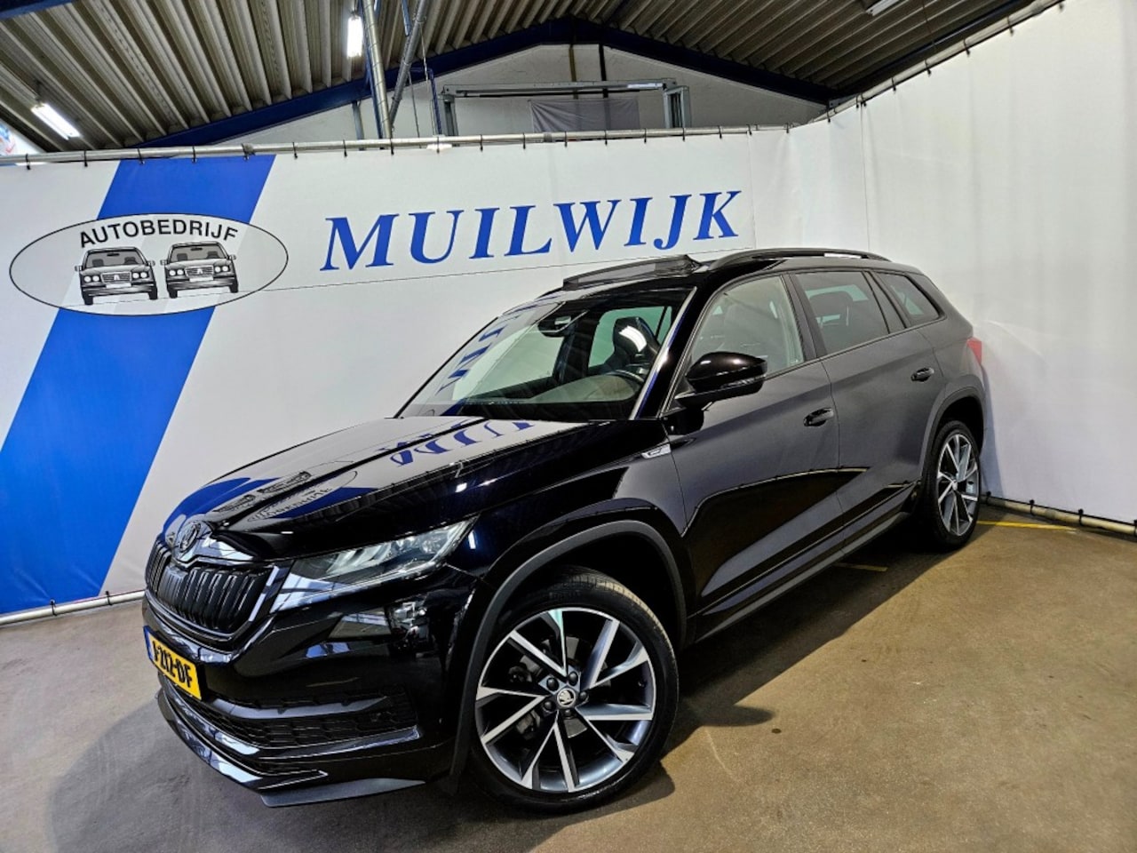 Skoda Kodiaq - 1.5 TSI Sportline Business / 7 Persoons / Trekhaak / NL Auto - AutoWereld.nl