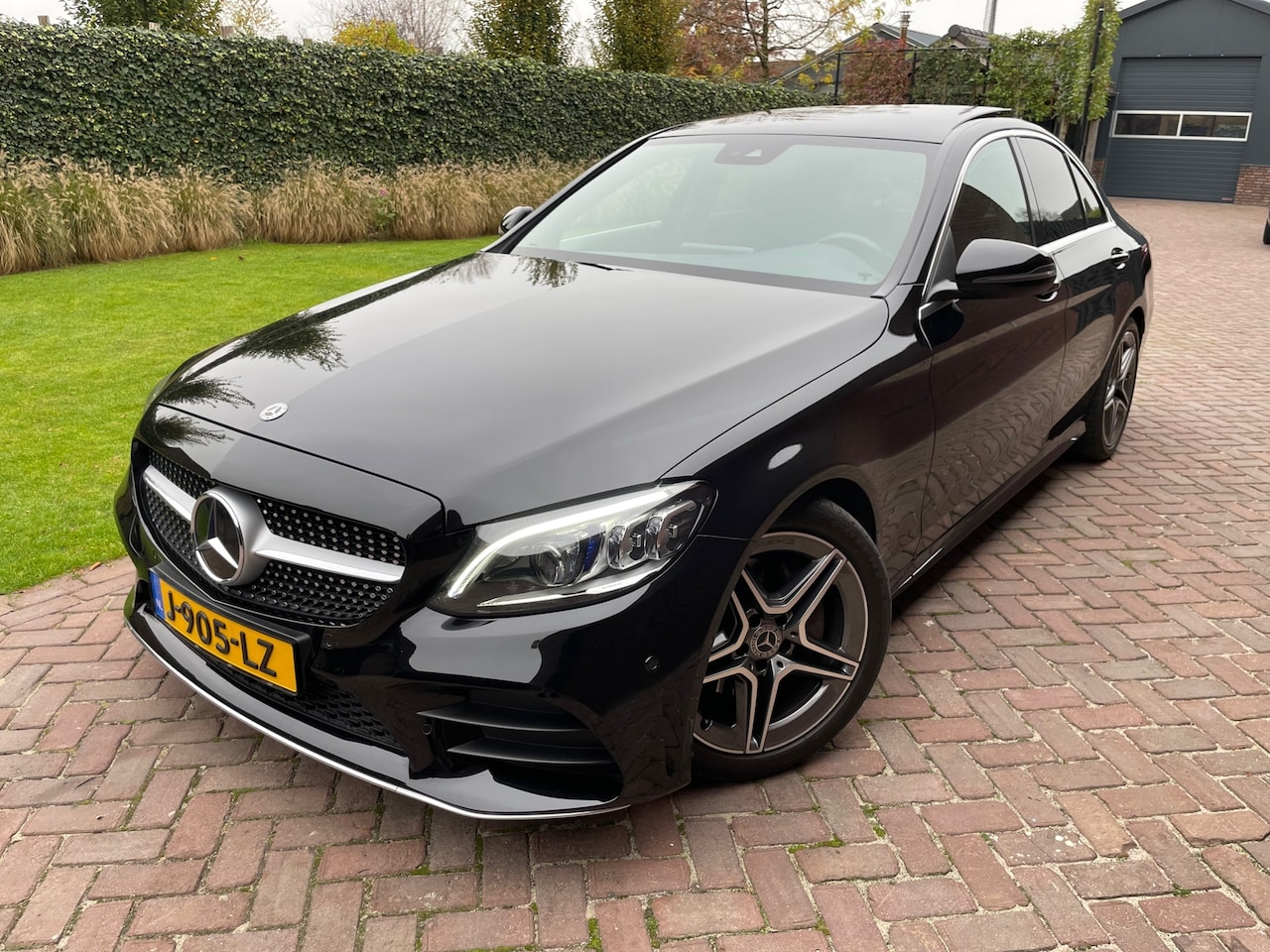 Mercedes-Benz C-klasse - 200 AMG Pano Carplay Camera 1e Eig. - AutoWereld.nl