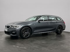 BMW 3-serie Touring - 330e High Executive | M Sportremsysteem Blau | Automatische sporttransmissie met stuurscha