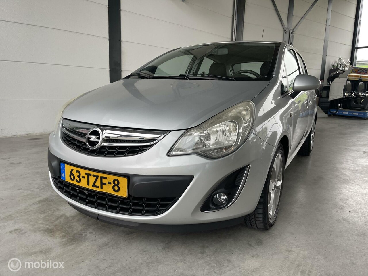 Opel Corsa - 1.4-16V NAVI CRUISECONTROL - AutoWereld.nl