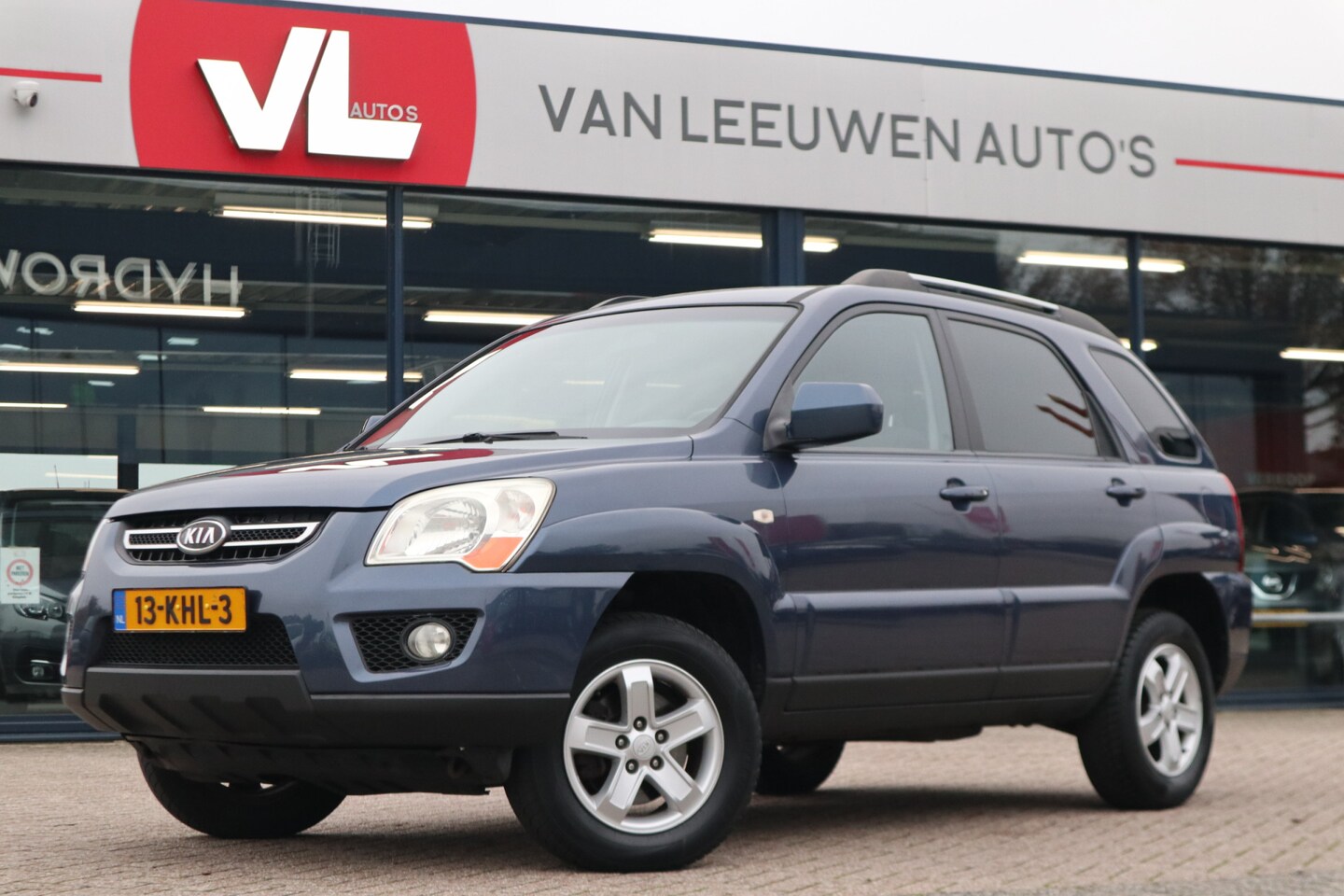 Kia Sportage - 2.0 CVVT X-ecutive | Automatische Airco | Trekhaak | Radio CD - AutoWereld.nl