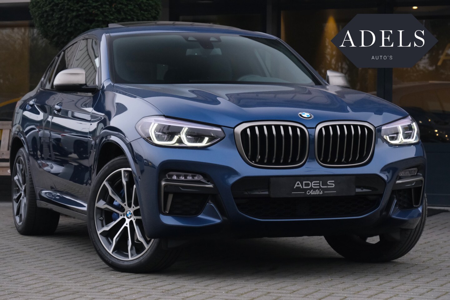 BMW X4 - M40i High Executive M Sport Panodak Harman Kardon Trekhaak Adaptive Led Adaptive Onderstel - AutoWereld.nl