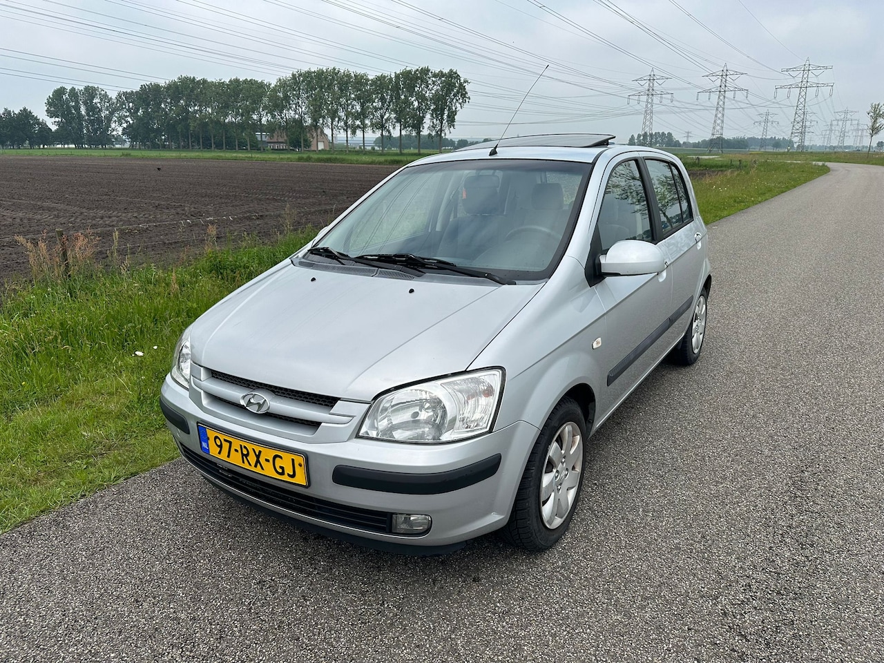 Hyundai Getz - 1.3i Dynamic Sky AIRCO ! - AutoWereld.nl