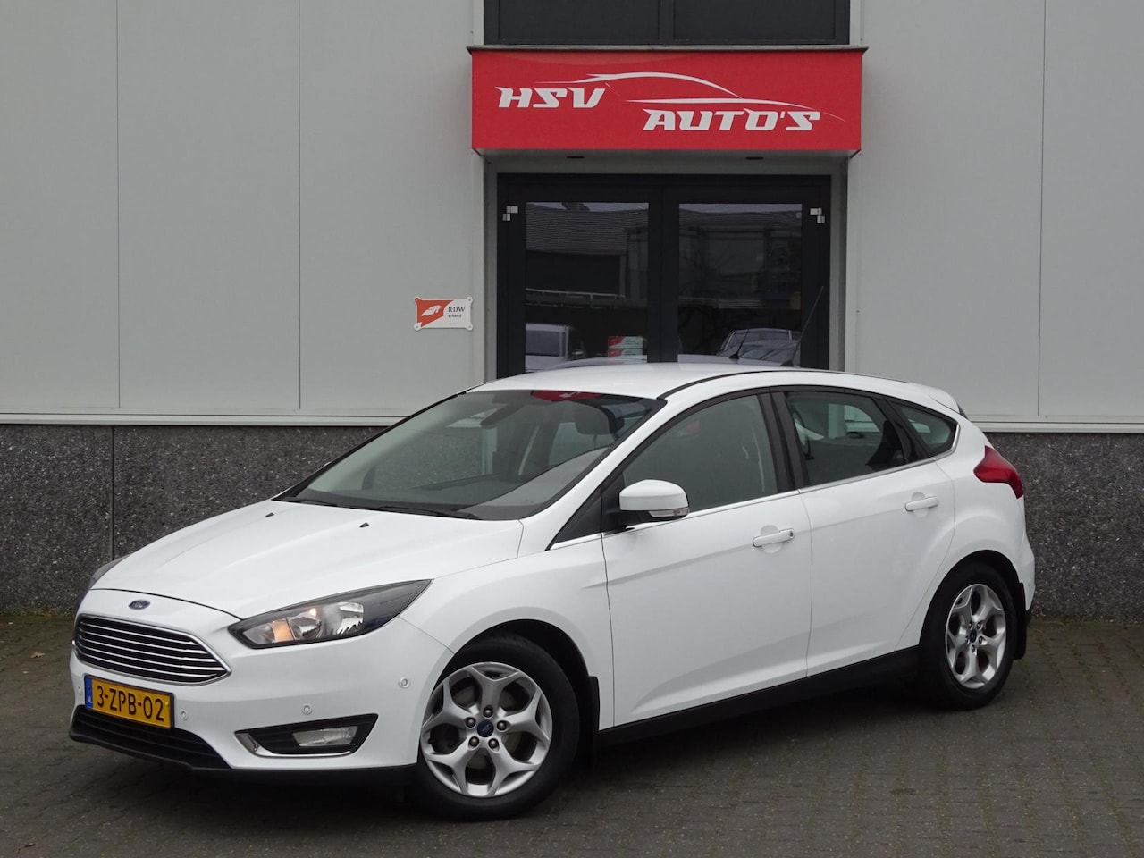 Ford Focus - 1.5 TDCI Titanium Edition airco LM navi 4-deurs - AutoWereld.nl