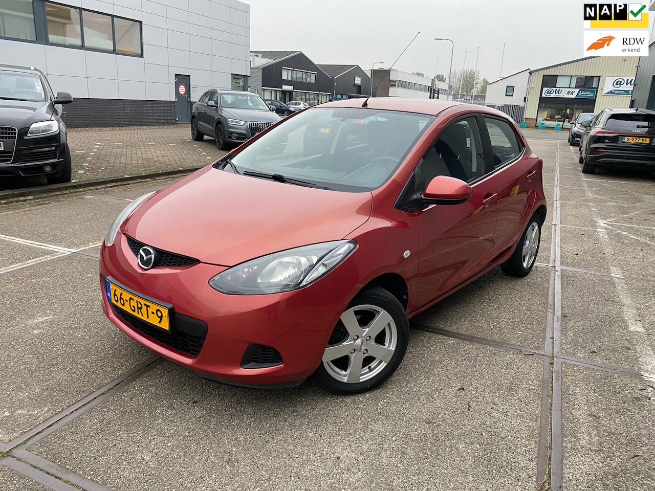 Mazda 2 - 1.3hp S-VT Touring/5drs/nap/2E EIG/dealeronderhouden/1jaar apk/EL-ramen/stoelverwarming/ze - AutoWereld.nl