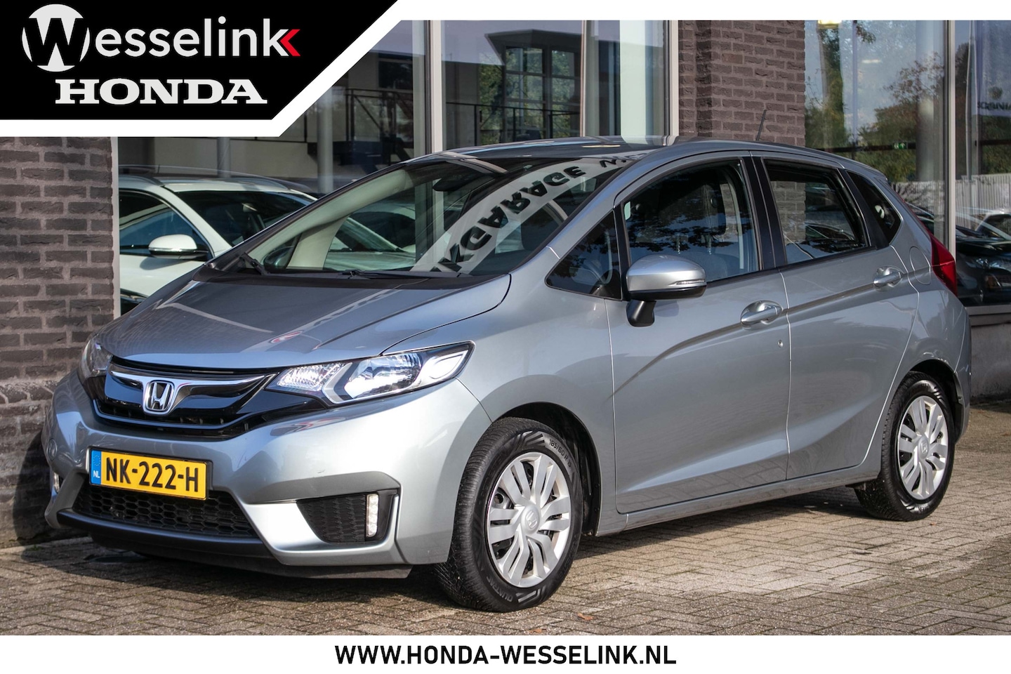 Honda Jazz - 1.3 i-VTEC Trend - All-in rijklrps | trekhaak | All- season banden - AutoWereld.nl