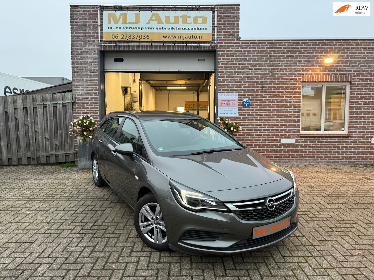 Opel Astra Sports Tourer - 1.4 Turbo 150PK automaat*airco*navi*cruise control - AutoWereld.nl