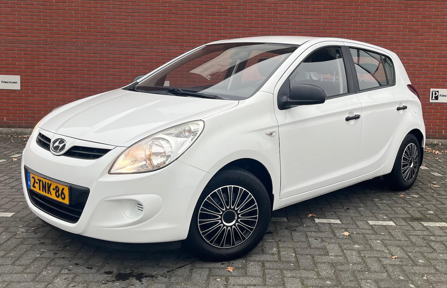 Hyundai i20 - 1.2i 78pk 5D i-Drive airco - AutoWereld.nl