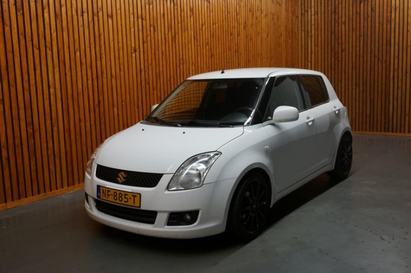 Suzuki Swift - 1,5 5 DRS COMFORT/ AIRCO/ NAVI - AutoWereld.nl