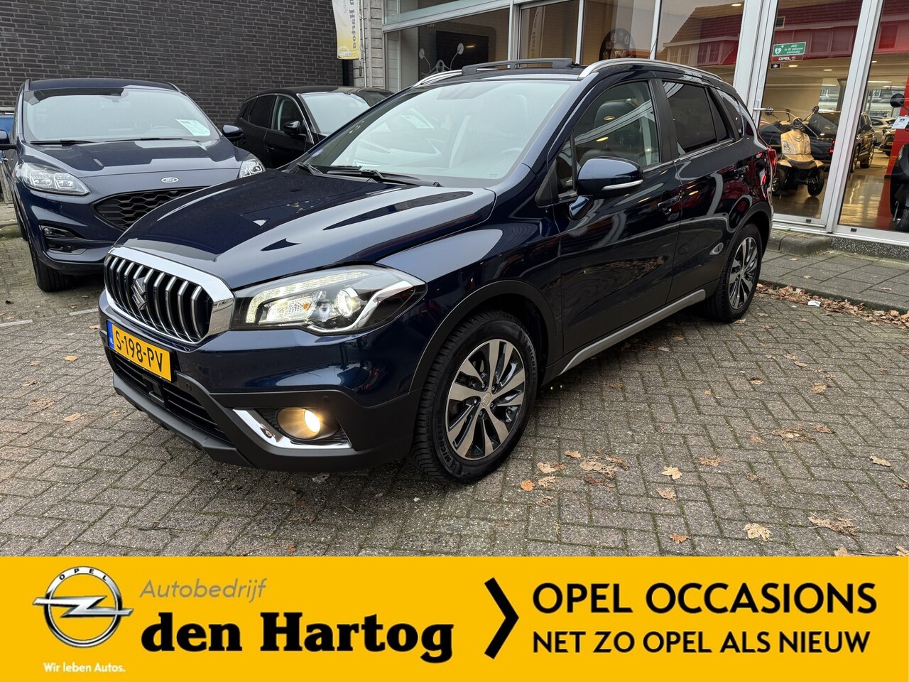 Suzuki S-Cross - 1.4 Boosterjet Style Smart Hybrid Navi/Leder/Panoramadak/Camera/Trekhaak - AutoWereld.nl