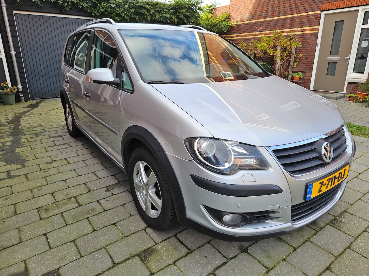 Volkswagen Touran - 1.4 TSI Optive CrossTouran 7 zitter - AutoWereld.nl