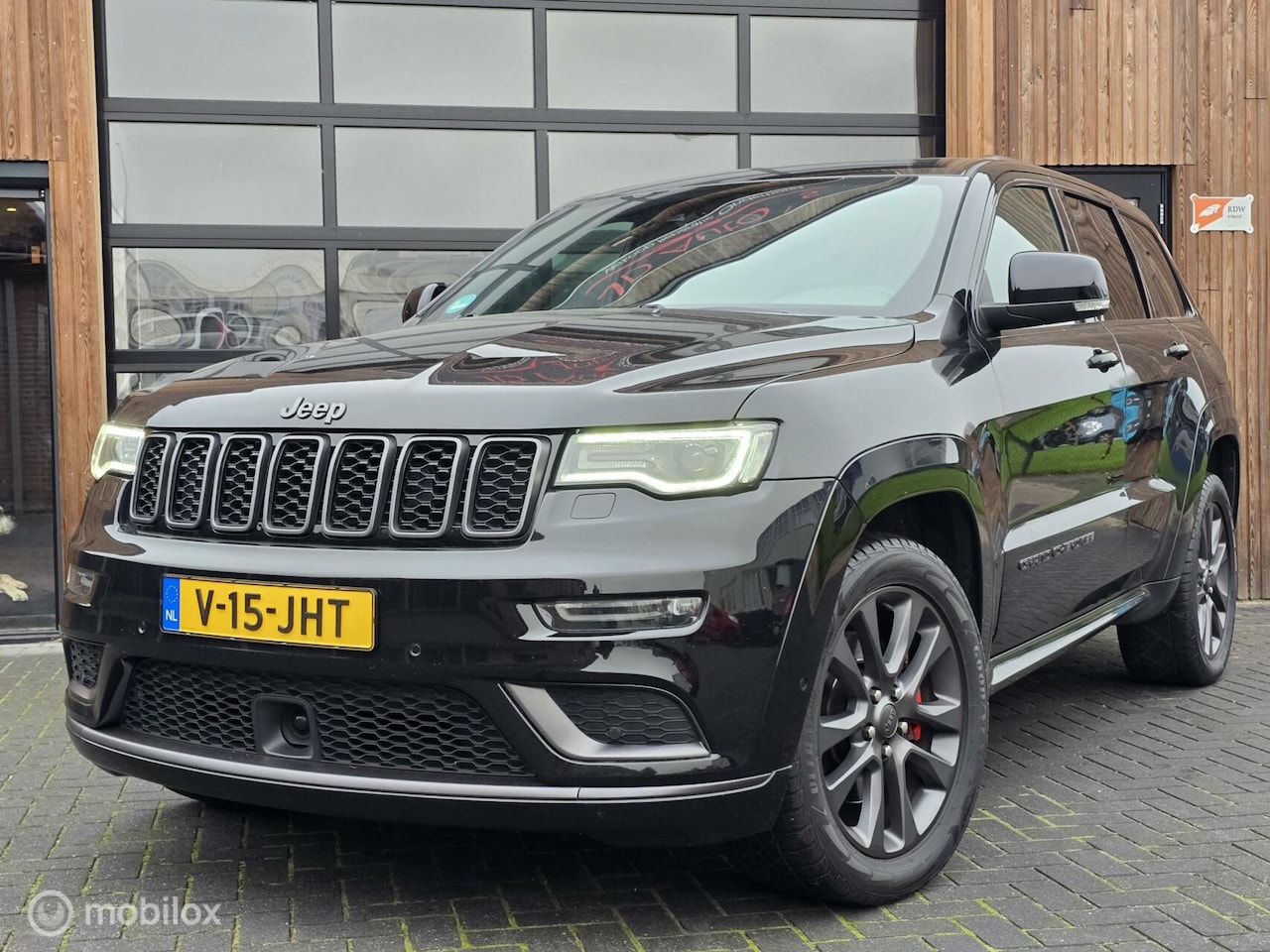 Jeep Grand Cherokee - 3.0 CRD S VAN GRIJS KENTEKEN PANO ACC - AutoWereld.nl