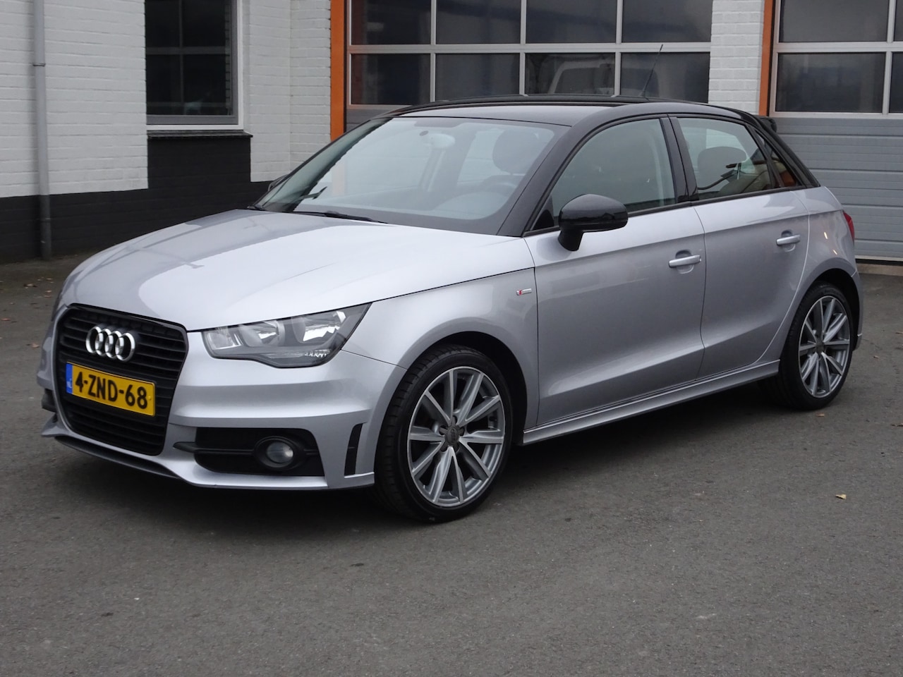 Audi A1 Sportback - 1.2 TFSI Admired Airco, navigatie, cruise controle, licht metalen velgen, zwart dak en spi - AutoWereld.nl