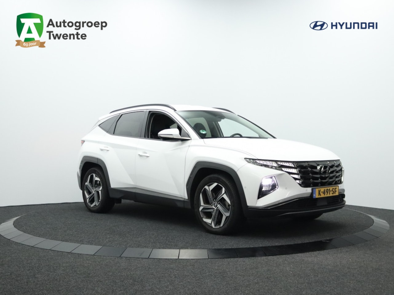 Hyundai Tucson - 1.6 T-GDI HEV Premium | Leder | Navigatie | 360 graden camera - AutoWereld.nl