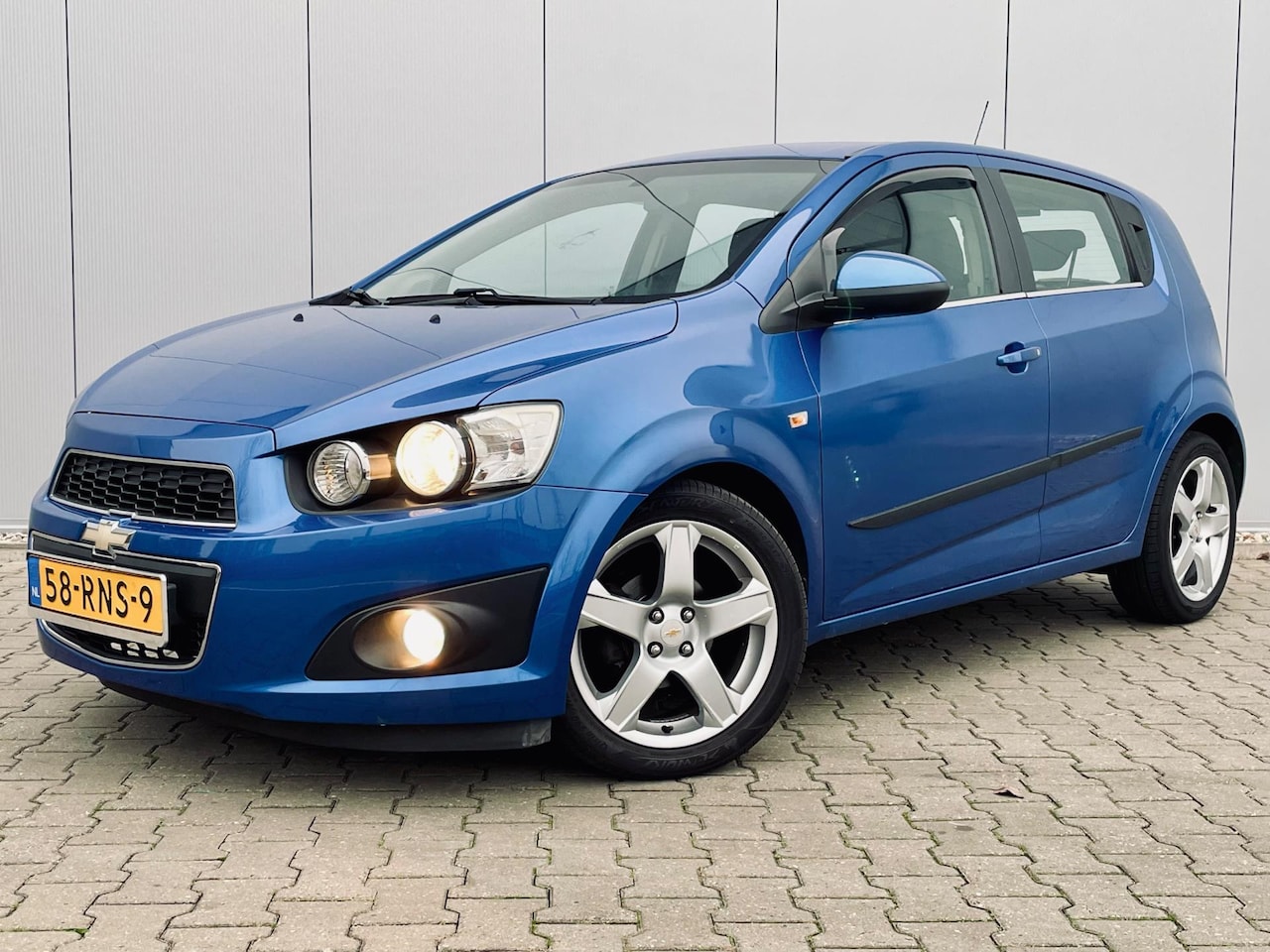 Chevrolet Aveo - 1.4 LTZ 1.4 LTZ, airco, cruise, pdc, 17 inch - AutoWereld.nl