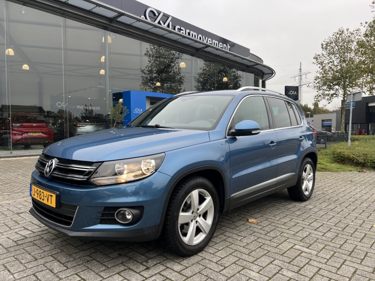 Volkswagen Tiguan - 1.4 TSI Comfort&Design Edition | Navi | Trekhaak | Camera | Stoe - AutoWereld.nl