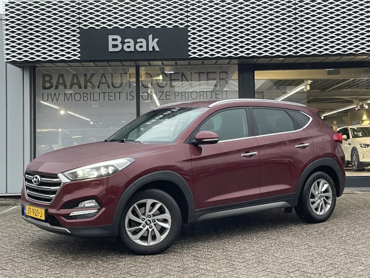 Hyundai Tucson - 1.6 GDi Premium | Camera | Navi | Leer - AutoWereld.nl