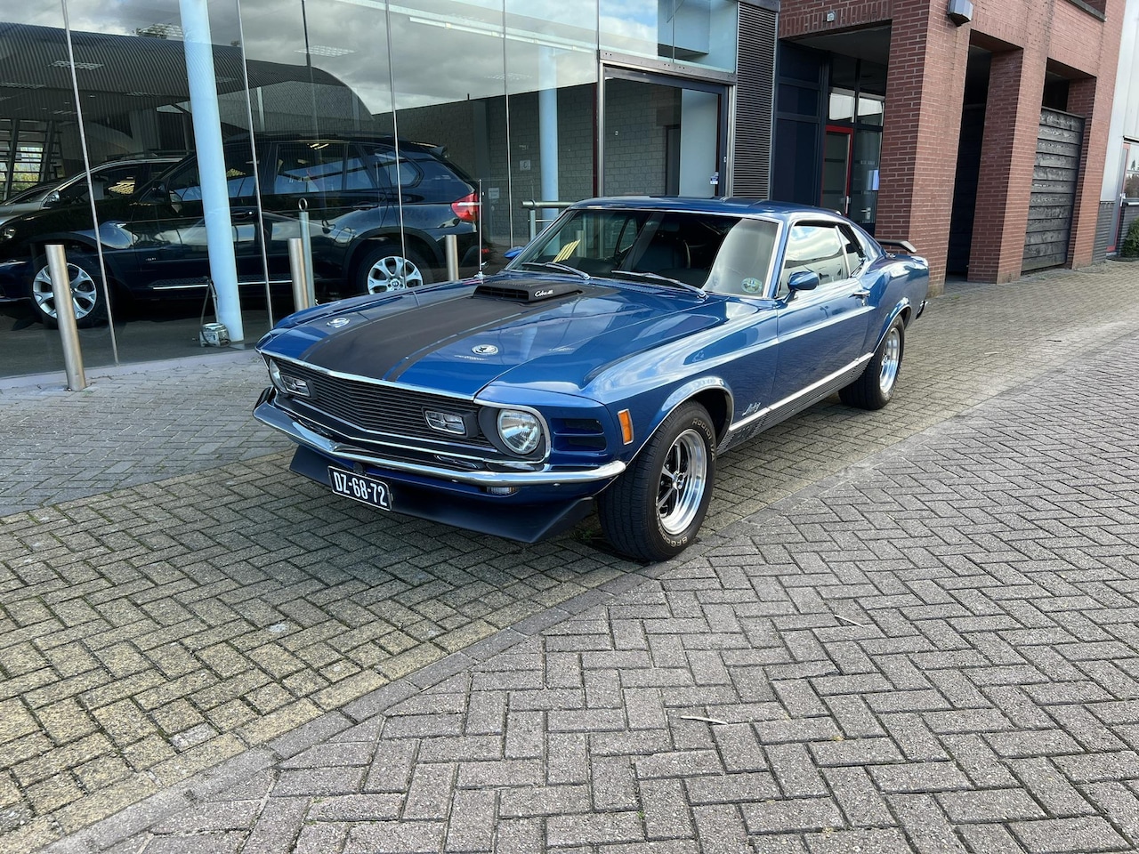 Ford Mustang - MACH1 428ci V8 “BIG BLOCK” - Automaat - Matching numbers - Cobra Jet Ram Air - AutoWereld.nl