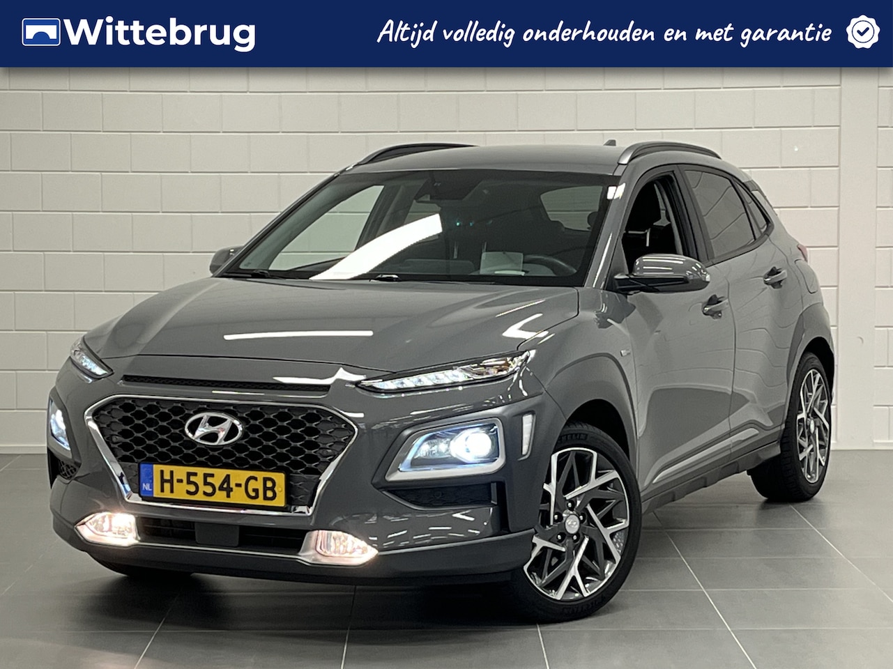 Hyundai Kona - 1.6 GDI HEV Premium FULL LED | LEDER | 18 INCH VELGEN | ZEER COMPLEET | UNIEKE KILOMETERST - AutoWereld.nl