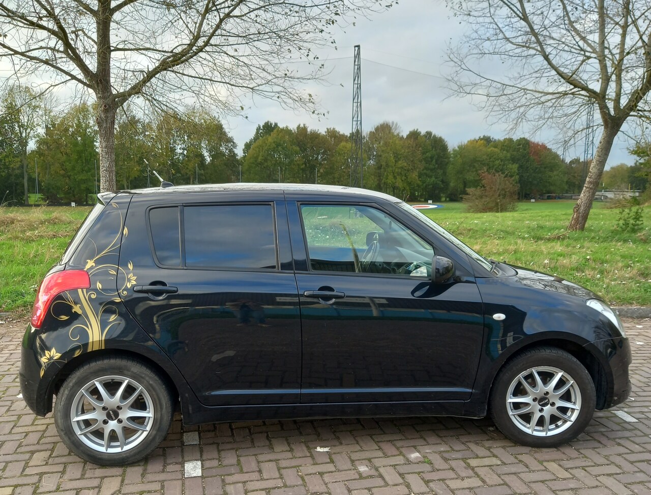 Suzuki Swift - 1.3 Base - AutoWereld.nl