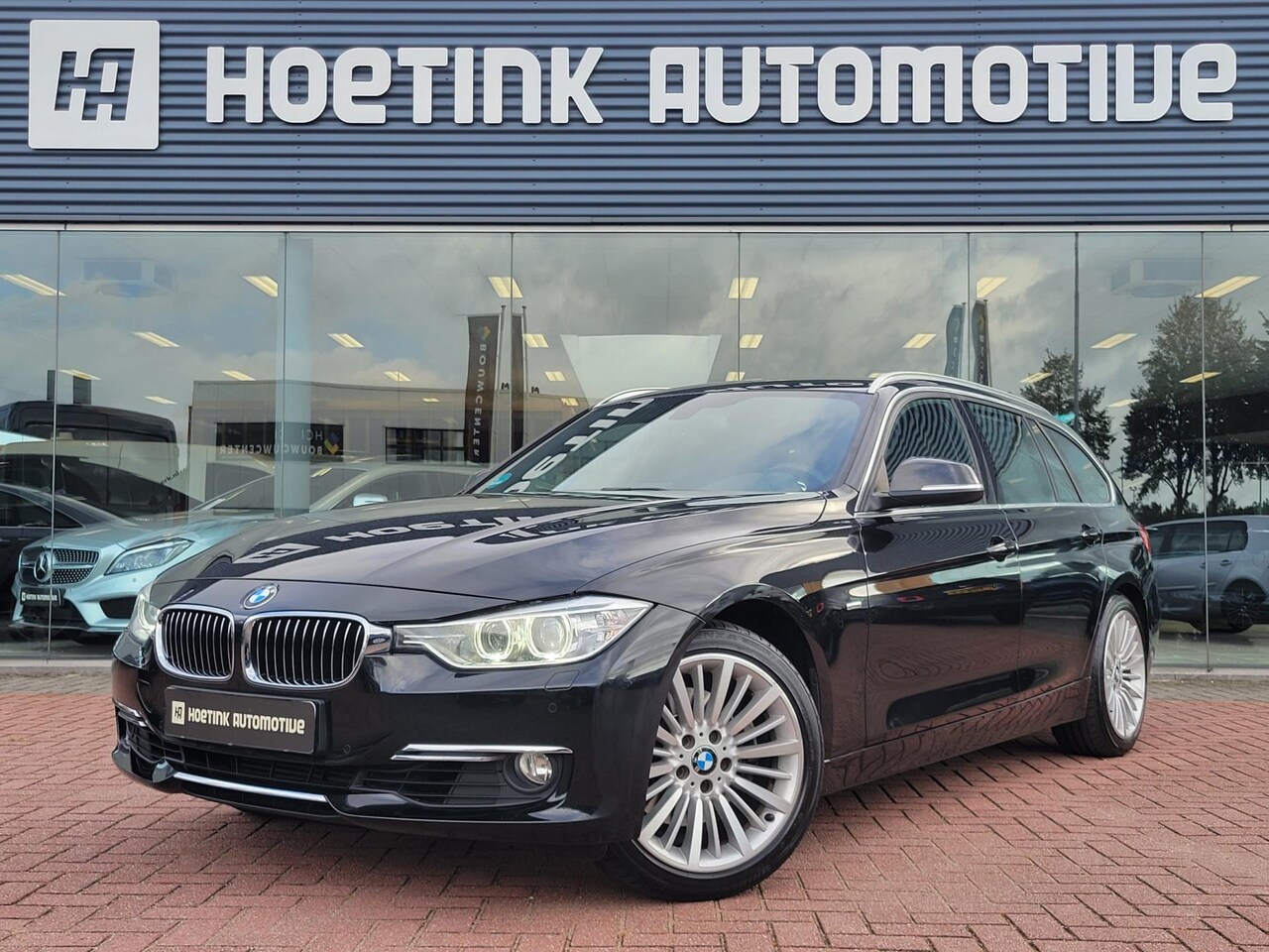 BMW 3-serie Touring - 328i High Executive / Luxury / HUD / Bi-xenon - AutoWereld.nl