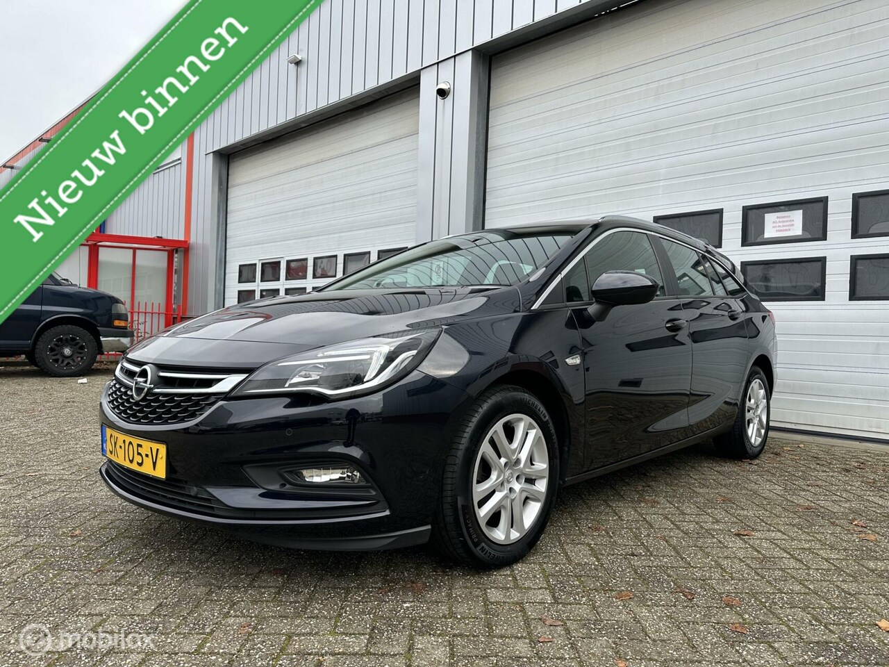 Opel Astra Sports Tourer - 1.0 Online Edition/1e Eigenaar/Navi - AutoWereld.nl