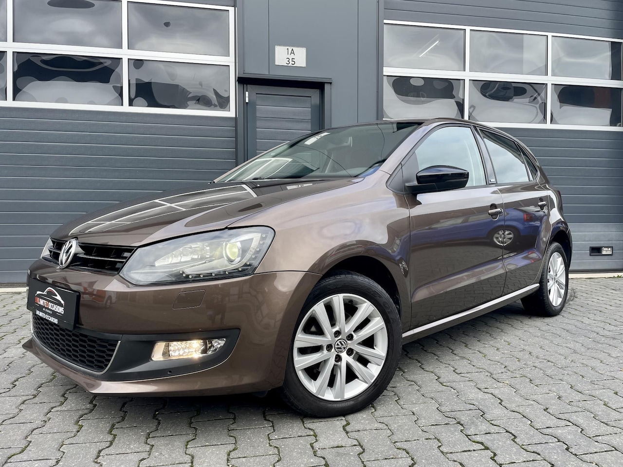 Volkswagen Polo - 1.2-12V STYLE *XENON*ECC*CRUISE*PDC*MFS STUUR - AutoWereld.nl