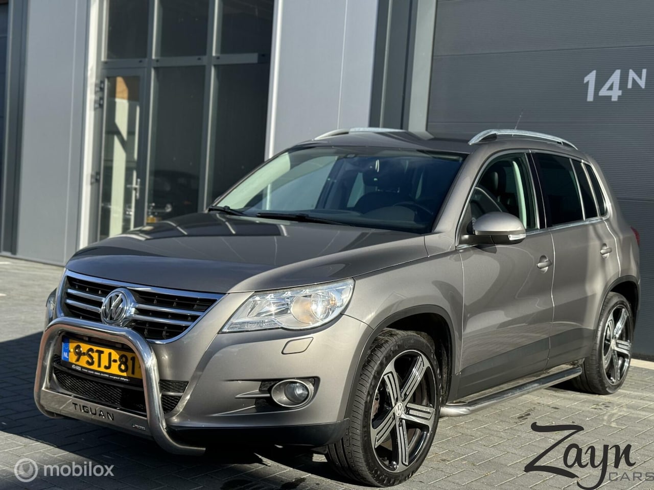 Volkswagen Tiguan - 2.0 TDI Comfort&Design 4Motion | Dynaudio - AutoWereld.nl