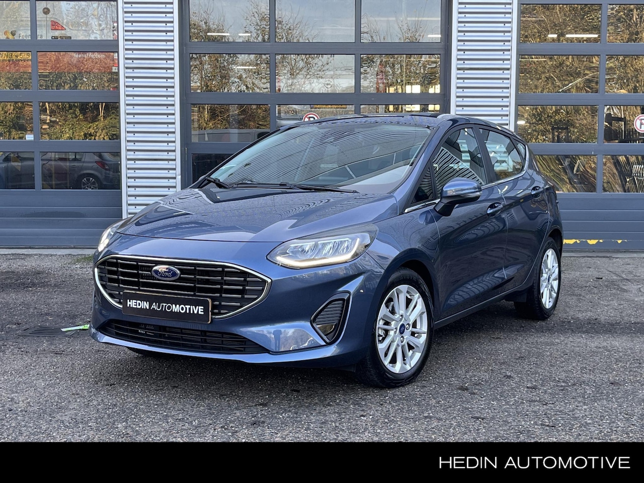 Ford Fiesta - 1.0 EcoBoost 125PK Hybrid Titanium | Navigatie via App | Camera | Climate control | Winter - AutoWereld.nl