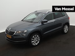 Skoda Karoq - 1.6 TDI Ambition Business | TREKHAAK | CLIMATE CONTROL | PARKEERSENSOREN | NAVIGATIE |