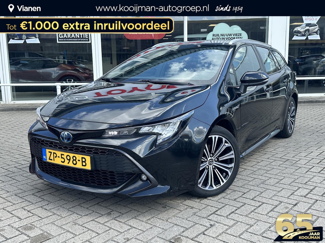 Toyota Corolla Touring Sports - 1.8 Hybrid First Edition + Trekhaak, BTW auto, mooie auto - AutoWereld.nl