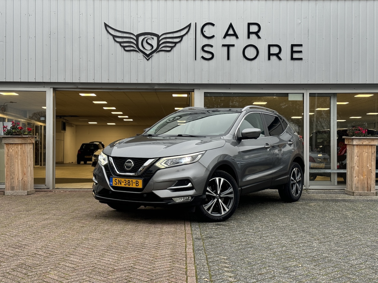 Nissan Qashqai - 1.2 Tekna |PANO|LED|CAMERA|PDC|18" VELGEN - AutoWereld.nl