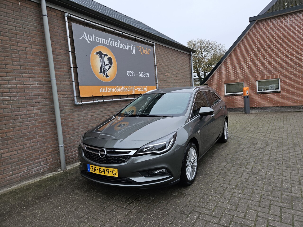 Opel Astra Sports Tourer - 1.4 Turbo 120 Jaar Edition 1.4 Turbo 120 Jaar Edition - AutoWereld.nl