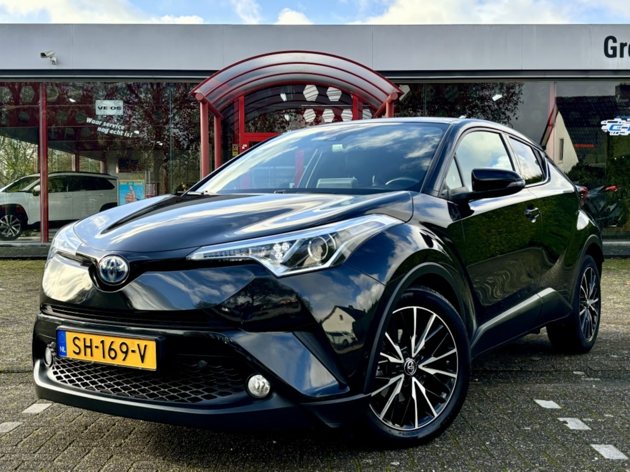 Toyota C-HR - 1.8 Hybrid Style | Navigatie | Lederen Bekleding | 18'' Lmv - AutoWereld.nl