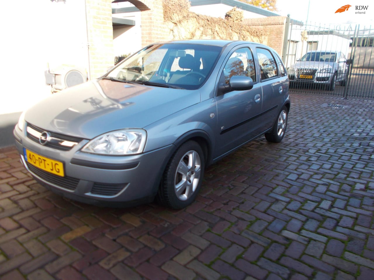 Opel Corsa - 1.2-16V Full Rhythm automaat 121 dkm nap airco - AutoWereld.nl