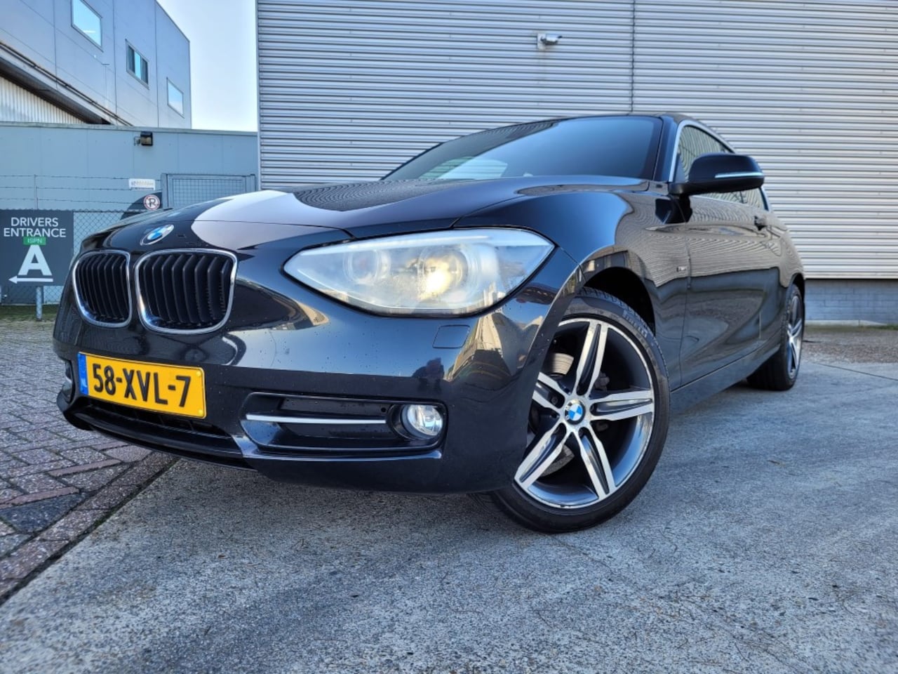 BMW 1-serie - 114i Business+ Leer, Xenon, Navi - AutoWereld.nl