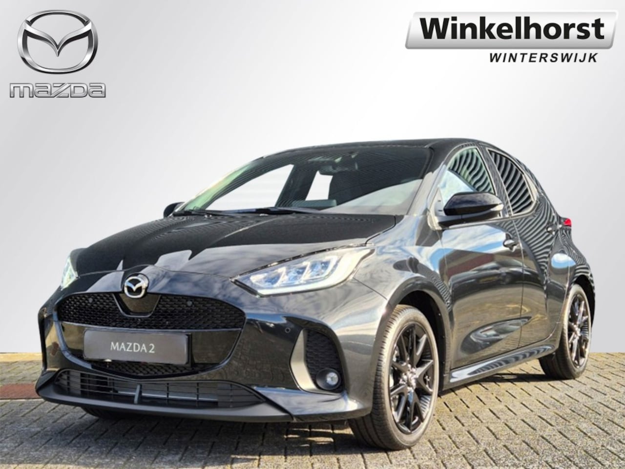 Mazda 2 Hybrid - MAZDA 2 FULL-HYBRID 116 HOMURA / MET €3000 VOORDEEL - AutoWereld.nl