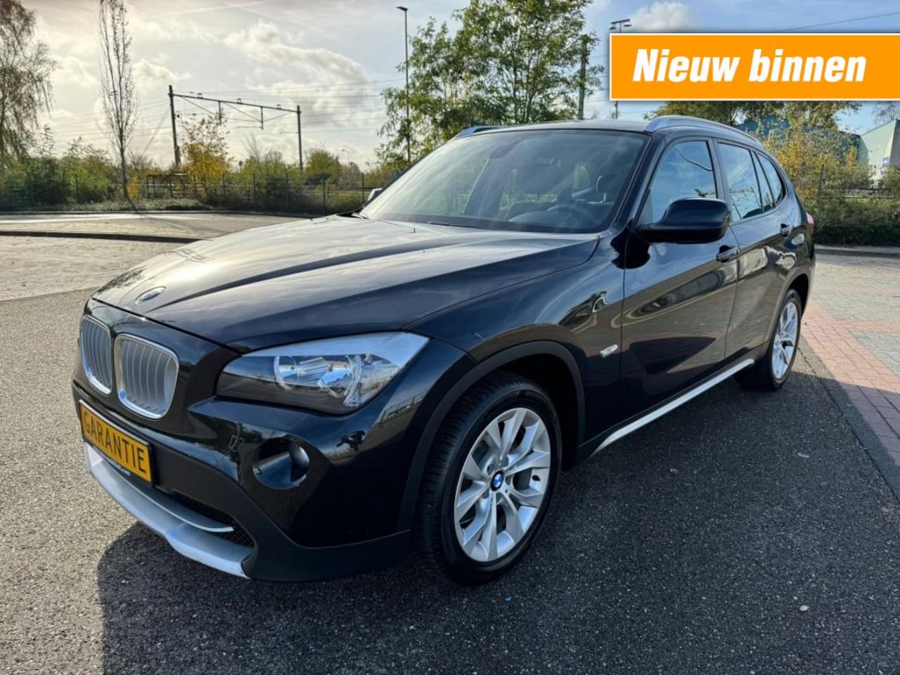 BMW X1 - 118I / AUTOMAAT / NAVI / CRUISE - AutoWereld.nl