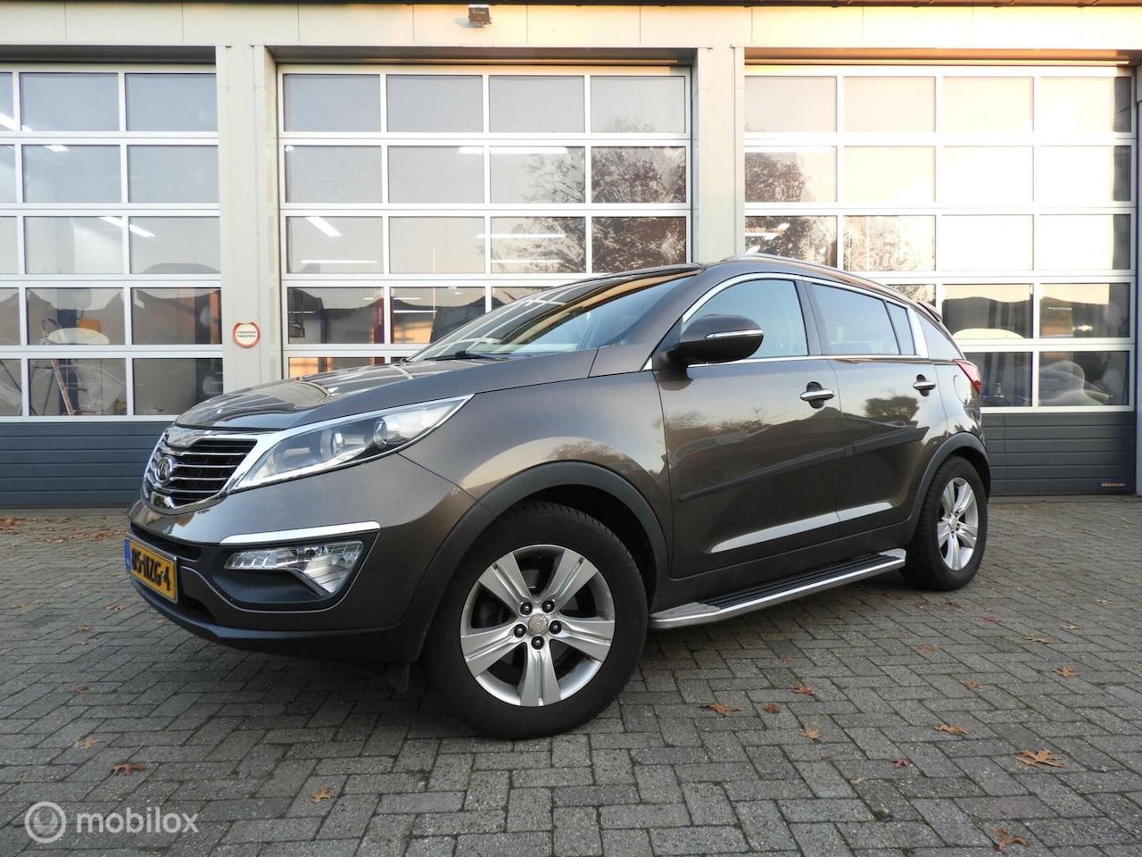 Kia Sportage - 2.0 X-ecutive 2.0 X-ecutive - AutoWereld.nl