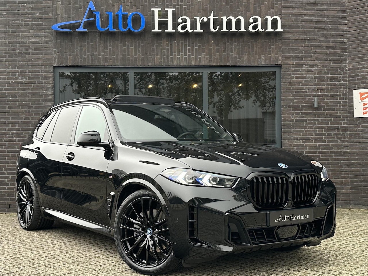 BMW X5 - xDrive50e M-Sport PANO | Harman Kardon | Soft-Close | LASER - AutoWereld.nl