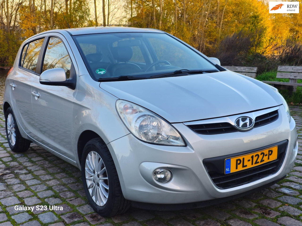 Hyundai i20 - 1.2i Business Edition airco stoelverwarming elektrische ramen trekhaak - AutoWereld.nl