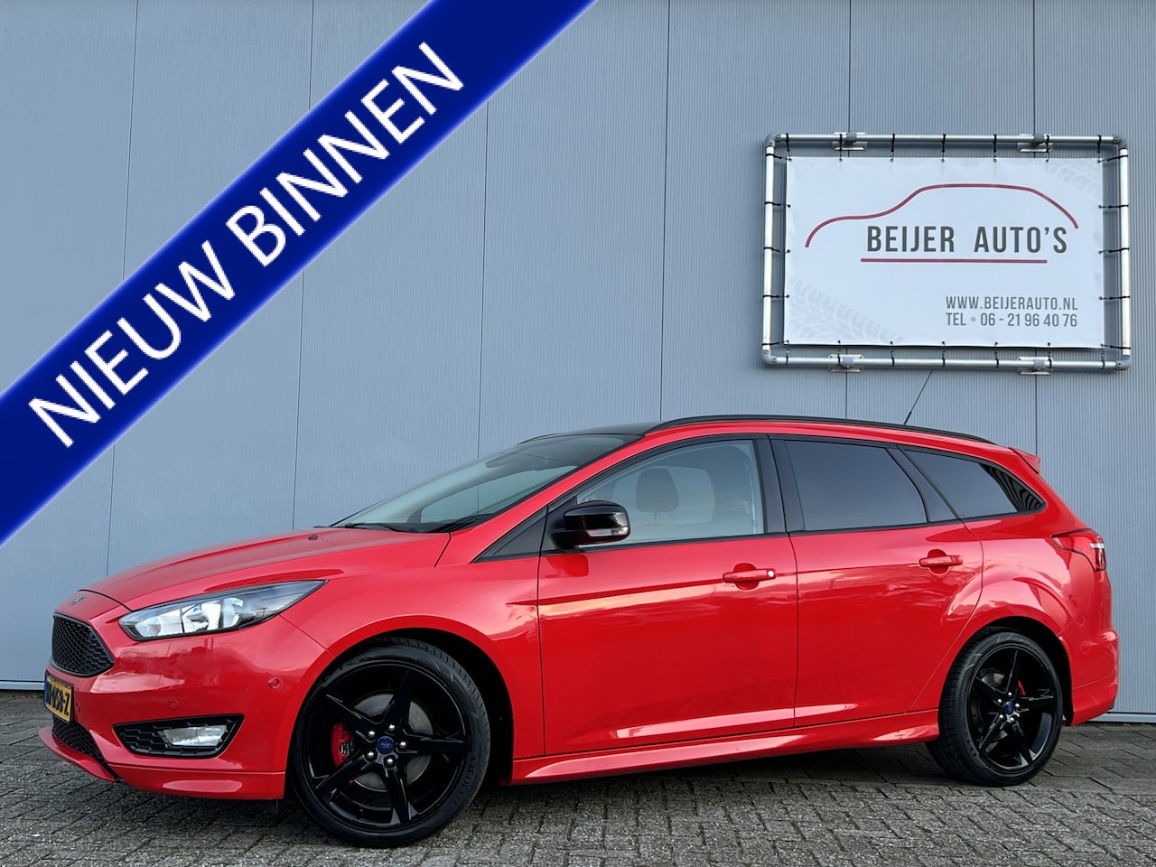 Ford Focus Wagon - 1.5 Red Edition Navigatie/Airco/18inch. - AutoWereld.nl