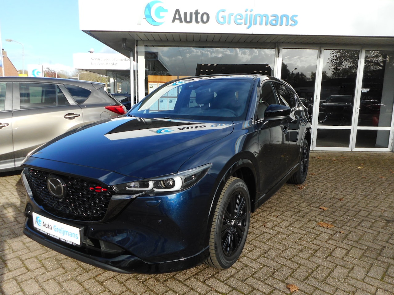 Mazda CX-5 - 2.0 e-SkyActiv-G M Hybrid Homura Leder pakket - AutoWereld.nl