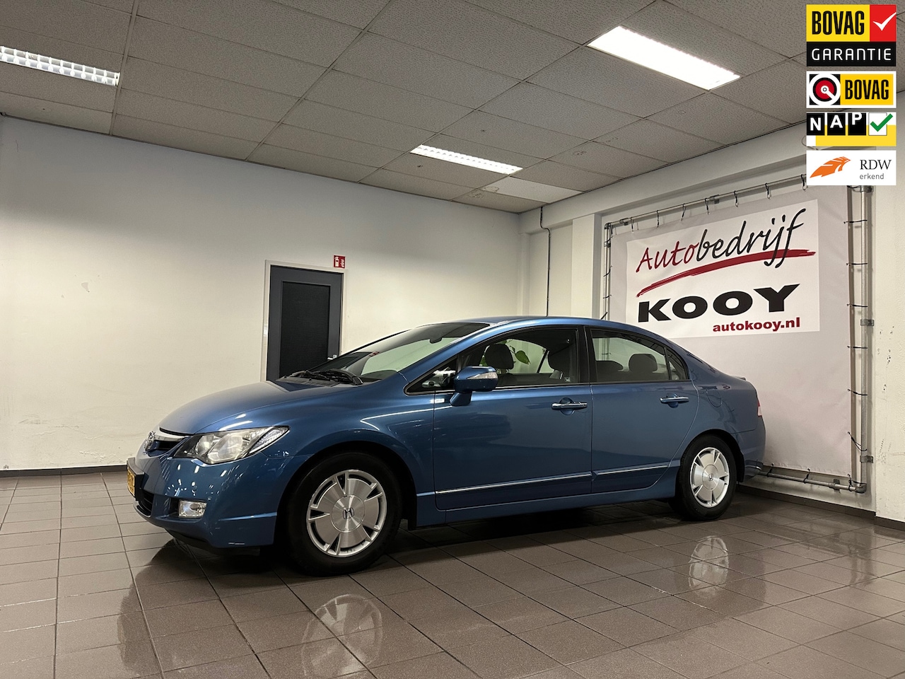 Honda Civic - 1.3 Hybrid * NL Auto / Stoelverwarming / Cruise control / LM Velgen / Airco-ecc * - AutoWereld.nl