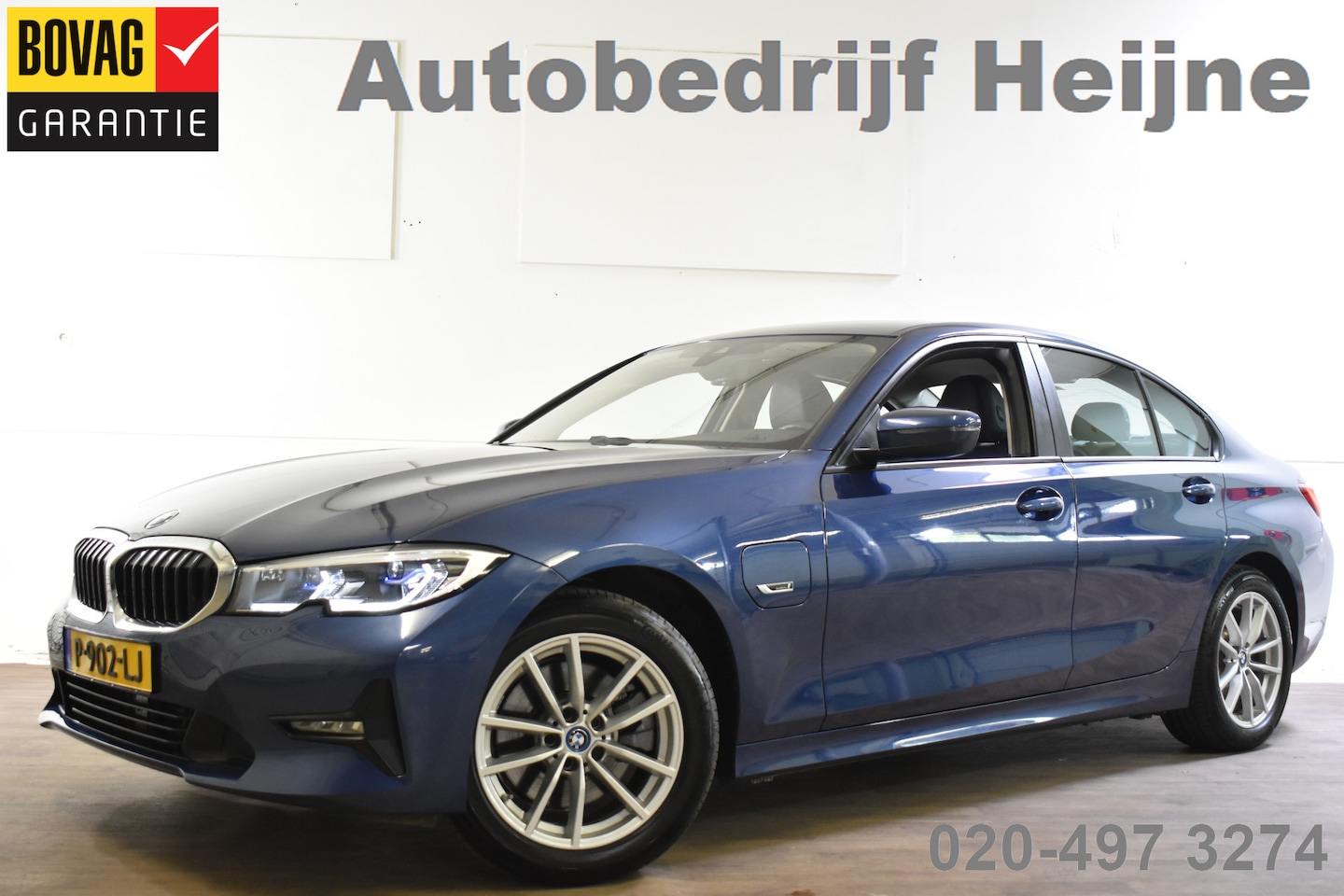 BMW 3-serie - 320e 204PK AUT. HYBRID BUSINESS SPORT LEDER/NAVI/PDC - AutoWereld.nl