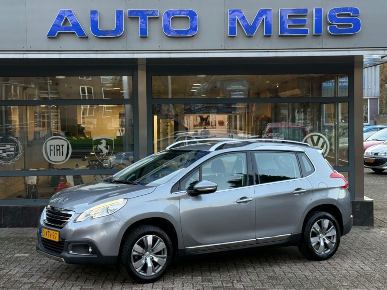 Peugeot 2008 - 1.2 PureTech Allure Navi Clima Cruise PDC - AutoWereld.nl