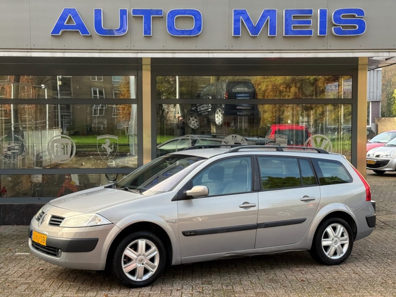 Renault Mégane - 1.6-16V Dynamique Comfort Clima Cruise Trekhaak - AutoWereld.nl