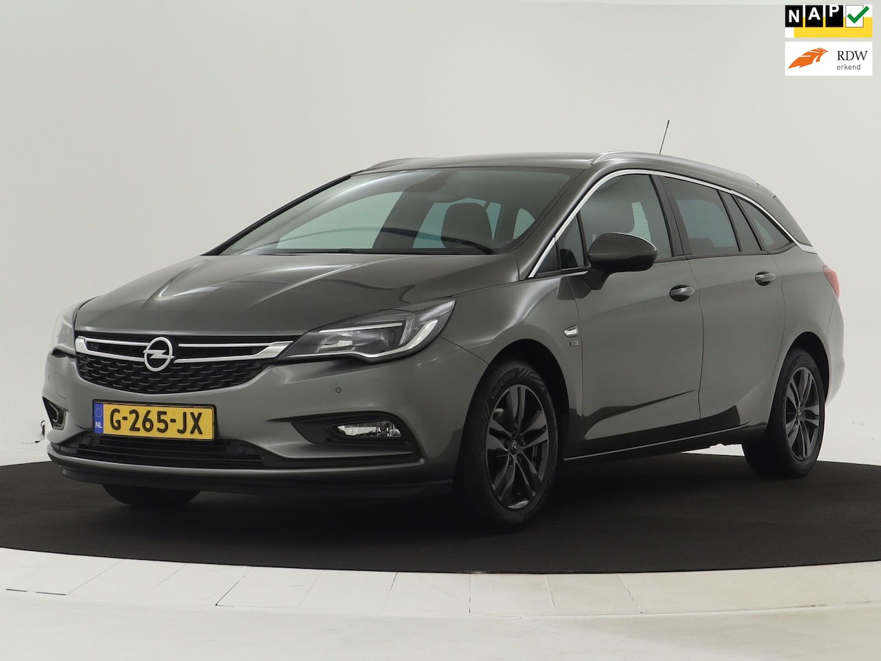 Opel Astra Sports Tourer - 1.0 Turbo 120 Jaar Edition NAVI | CarPlay | 1ste eigenaar - AutoWereld.nl