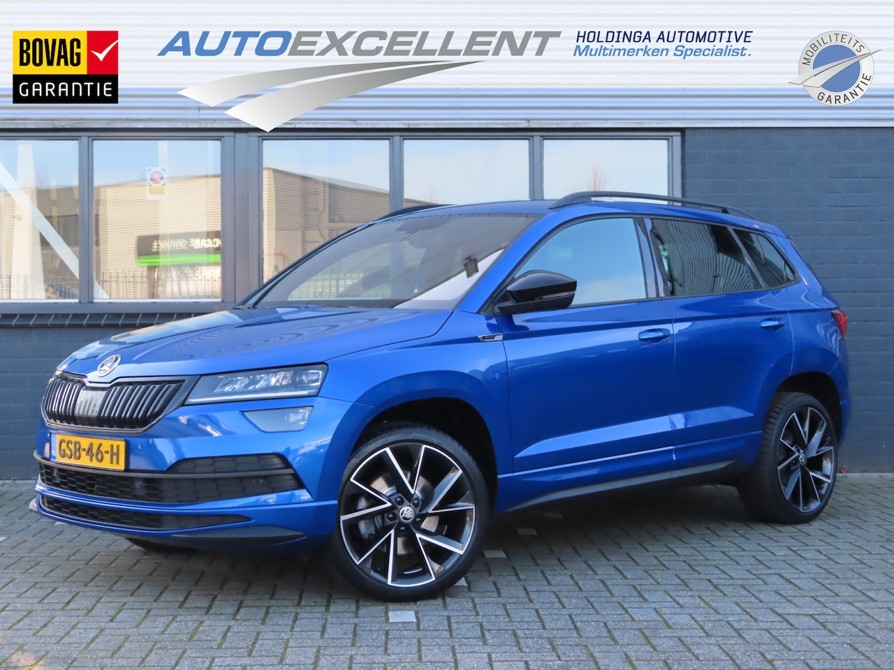 Skoda Karoq - 1.5 TSI ACT Sportline Business DSG | trekhaak wegklapbaar | voorstoelen + achterbank verwa - AutoWereld.nl